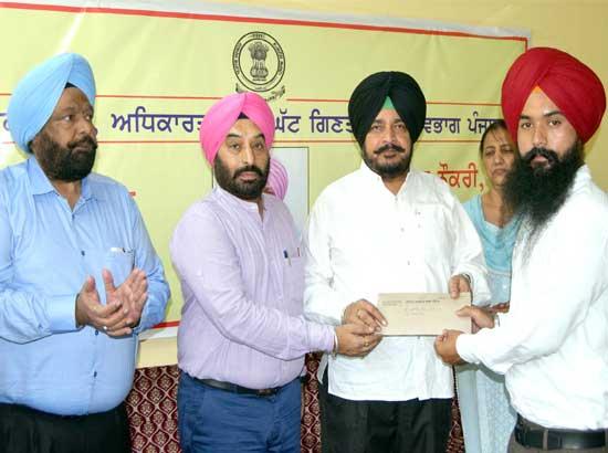Dharamsot hands over appointment letters to 20 clerks