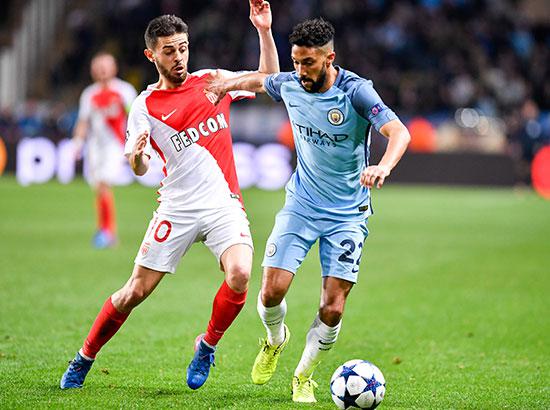 Gael Clichy of Manchester City competes with Bernardo Silva of AS Monaco