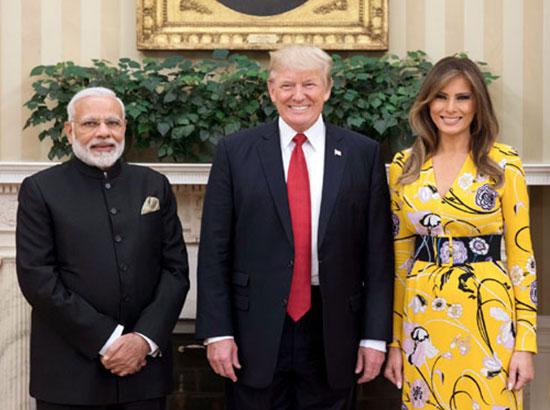 The Prime Minister,  Narendra Modi with the President of United States of America (USA), Mr. Donald Trump and the first lady of USA, Ms. Melania Trump
