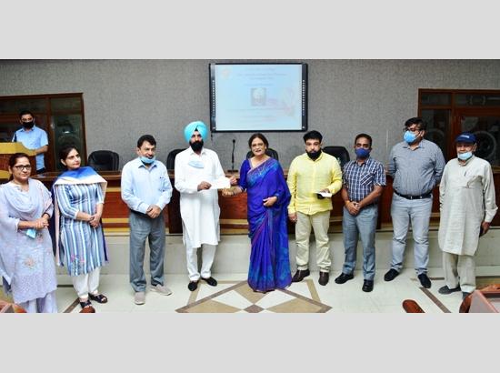MLA Pinki hands over Rs.25 lakh grant cheque to  College  for Solar Project