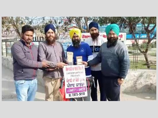 Mansa based youth Tejinder Singh pedalling across state to promote Punjabi