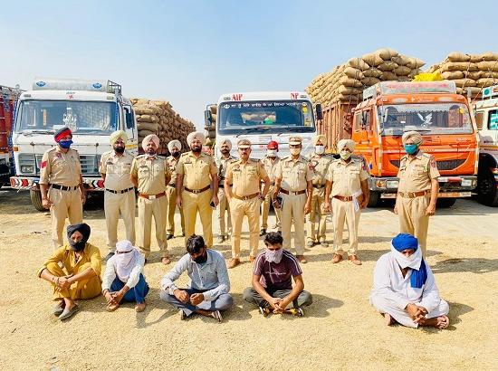 Trucks transporting paddy from UP to Punjab impounded by Police : five arrested