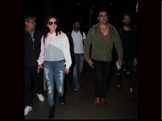 Mumbai: Sunny Leone and Arbaaz Khan seen at airport
