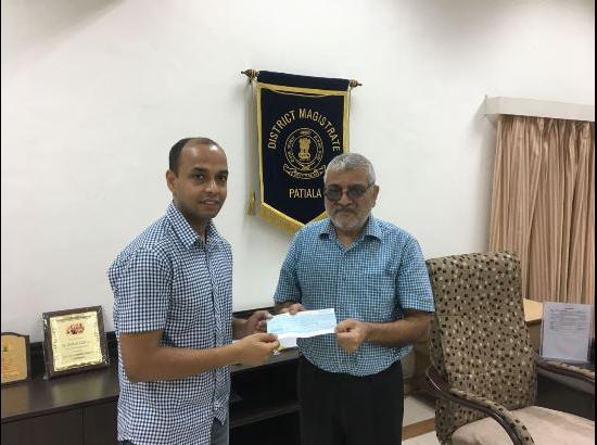Dharmavira Gandhi contributed salary cheque to DC for Kerala Flood Victims

