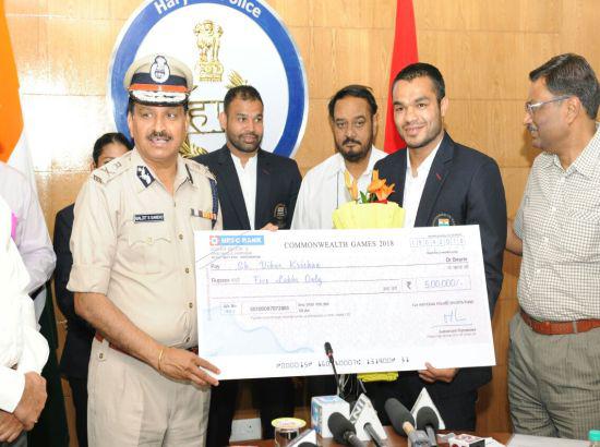 Haryana DGP BS Sandhu honours CWG medallist cops with cash awards