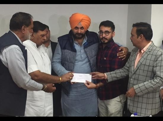 Sidhu hands over job appointment letters to 5 kin of deceased employees of Ludhiana fire tragedy