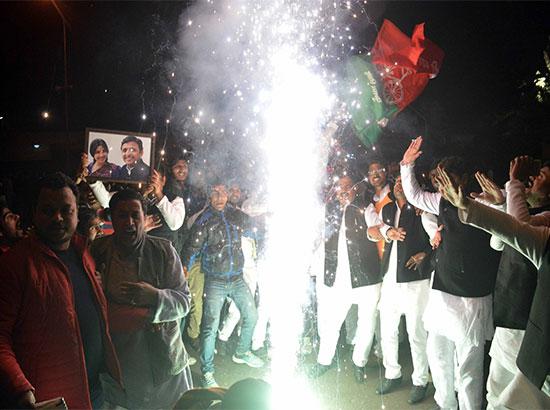 Lucknow: supporters of akhilesh yadav celebrate after the election commission 