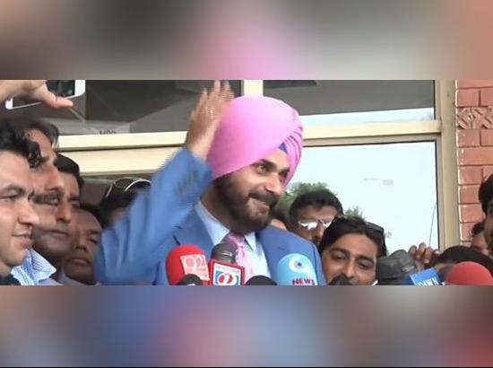 Under attack Sidhu returns from Pakistan, tries to defends himself