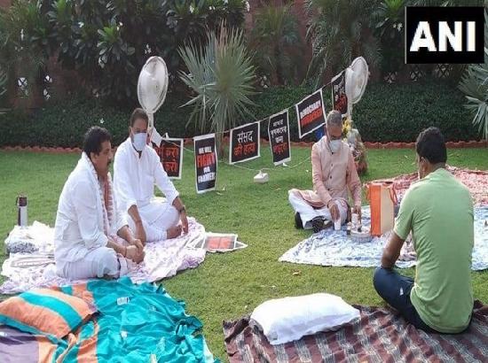 RS Deputy Chairman brings tea for 8 suspended MPs who camped overnight on Parliament lawns