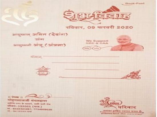 Groom prints support for CAA on his marriage card