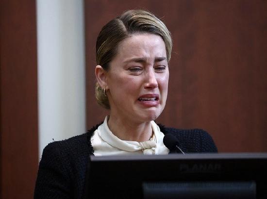 Amber Heard bursts into tears as she recounts sexual assault by Johnny Depp