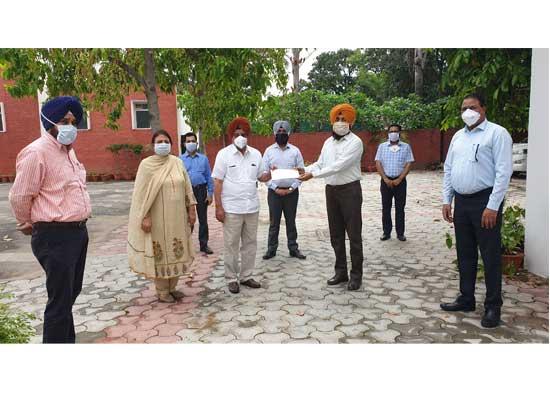 Punjab Rural Development Officers Association hands over check for CM Relief Fund to Tript Bajwa
