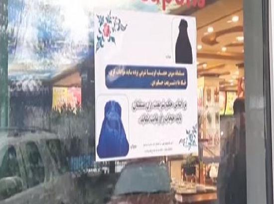 Taliban religious police issue posters ordering Afghan women to cover-up