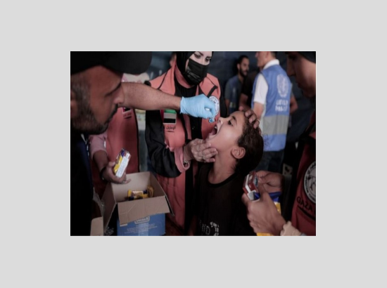 Four children among six injured in attack on Gaza vaccination centre
