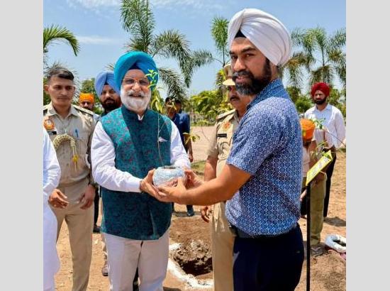 Taranjit Sandhu plants tree in memory of elder brother at Gurdwara Patalpuri Sahib