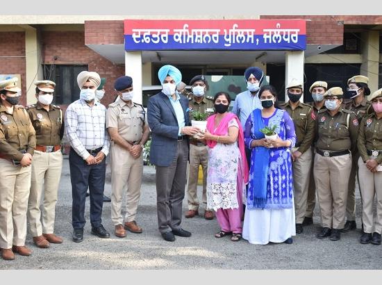 Jalandhar: CP hands over flowerpots and plants to women visitors and officials on International Women's day
