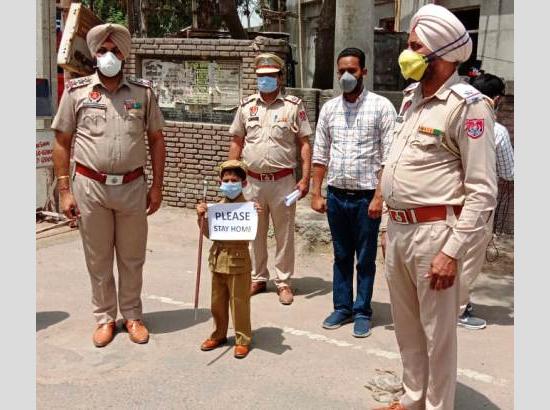 5-year-old Khushkirat in ‘police officer’ costume urges to stay home in fight against corona