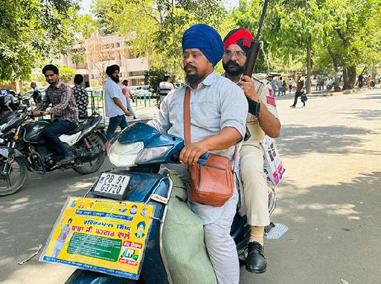 On his scooter with gunman, Babaji Burgerwala campaigns in Ludhiana