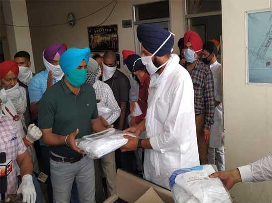 Bikram Majithia distributes 500 PPE kits, bats for economic package