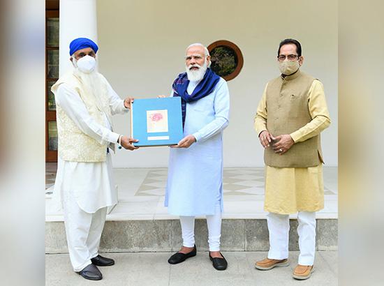 PM releases book on Guru Nanak Dev ji , penned by Chandigarh citizen