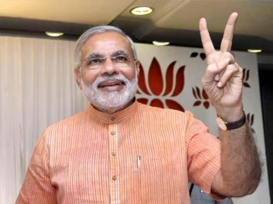 Modi flashes victory sign, Congress office wears deserted look