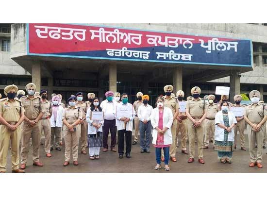 Police led by SSP wears nameplate displaying Harjit Singh to express solidarity
