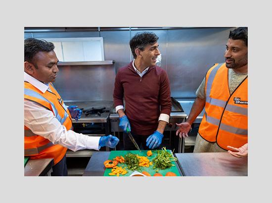 British Prime Minister Rishi Sunak Volunteers With Go Dharmic-Actively participated in preparing Vegan Kichari – a nutritious