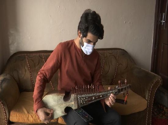 This Kashmiri artist is inspiring youth to learn traditional instrument of 'Rabab'