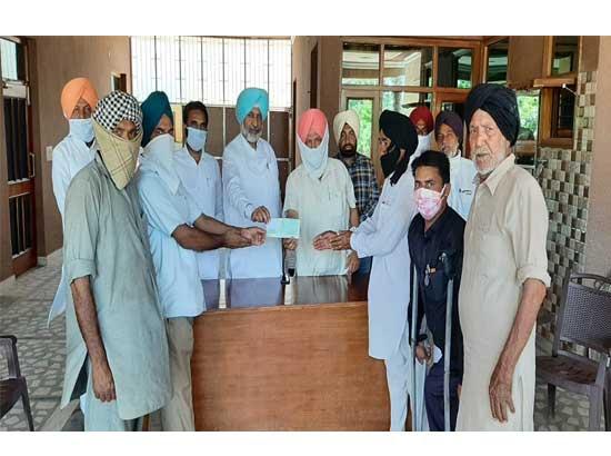 Balbir Sidhu hands over cheque of Rs. 4 lakh for construction of Dharamshala in village Kurri
