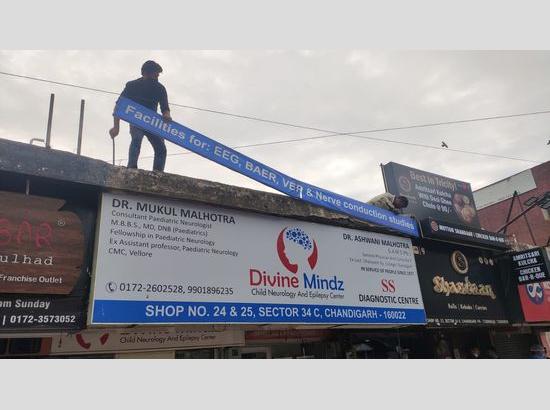 Illegal publicity hoardings removed by MC from Chandigarh markets (Watch Pics)