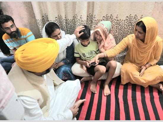 CM hands over cheques worth Rs 1 crore each as financial assistance to distressed families of two brave hearts martyred at Anantnag