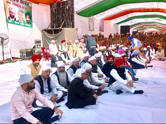 Congress Ministers, MPs, leaders sit on ground in protest