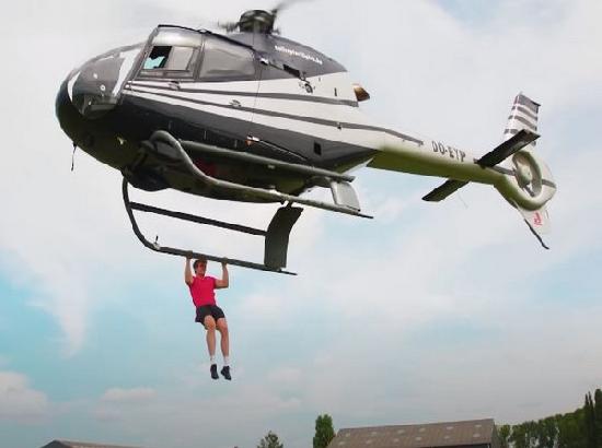 YouTubers smash Guinness World Record by doing 25 pull-ups from helicopter