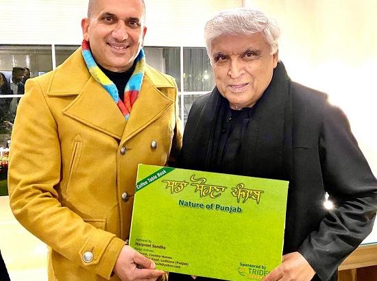 Author-Lawyer Harpreet Sandhu presents pictorial book 'Nature of Punjab' to Javed Akhtar